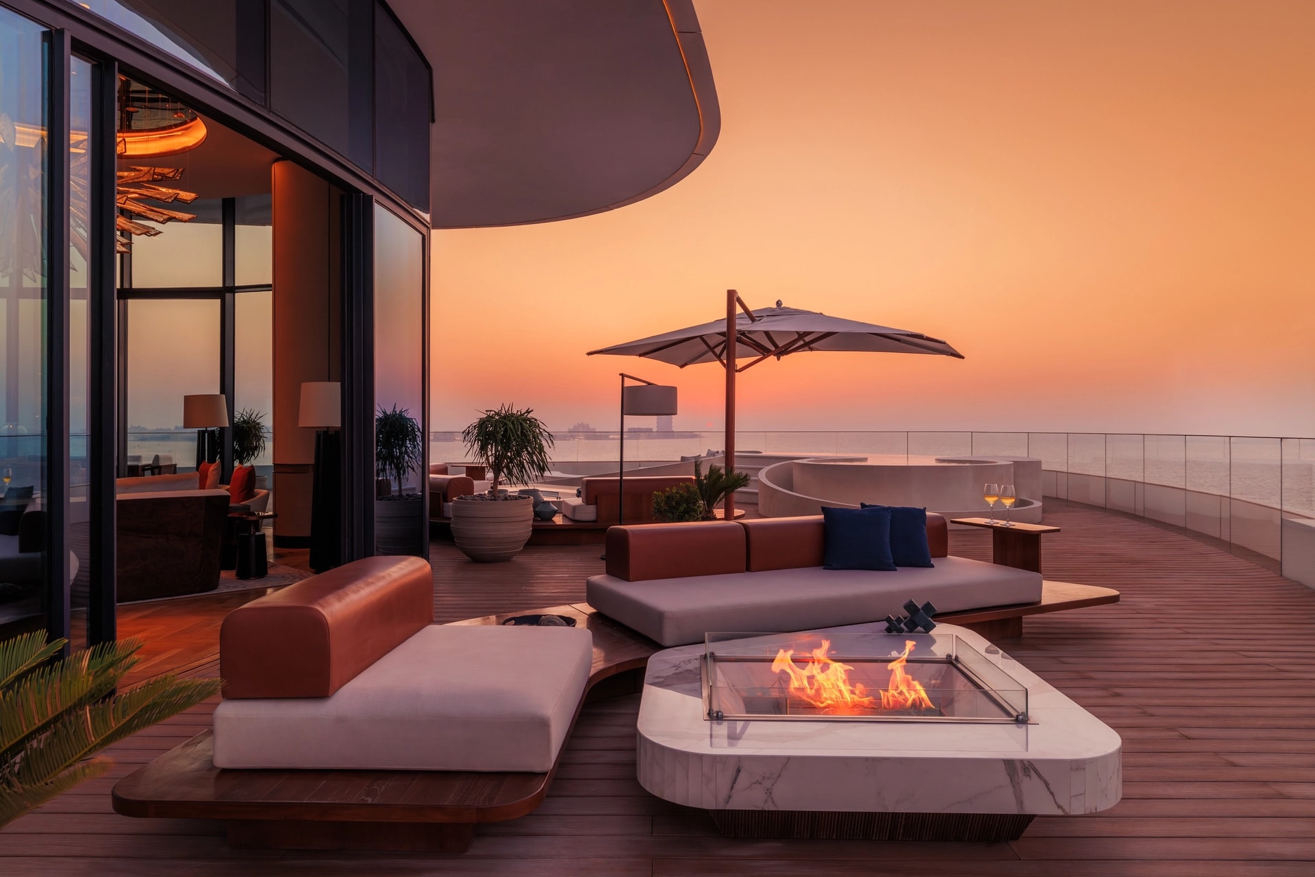 Marsa Al Arab terrace overlooking the sea at sunset
